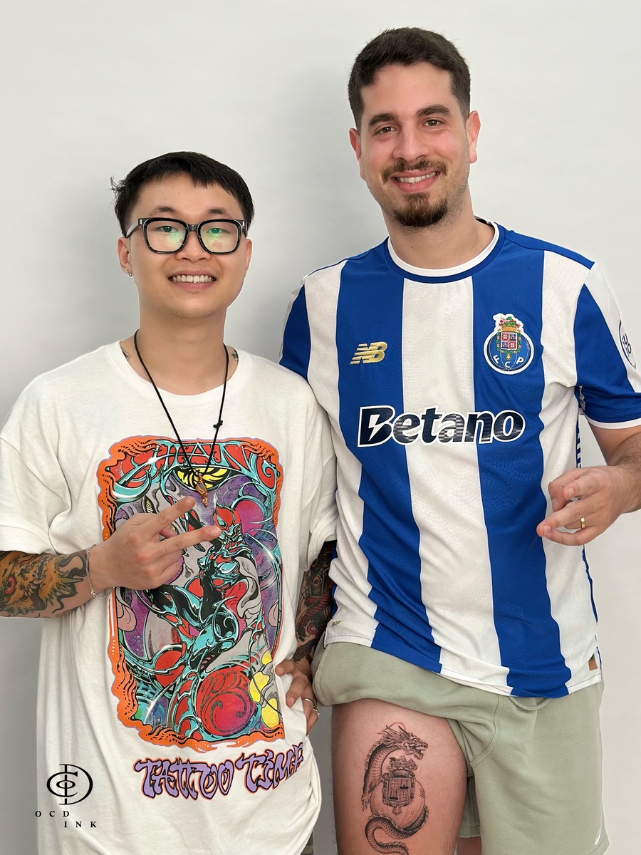 artist Sulley with his client with dragon tattoo - our client - OCD Ink Studio