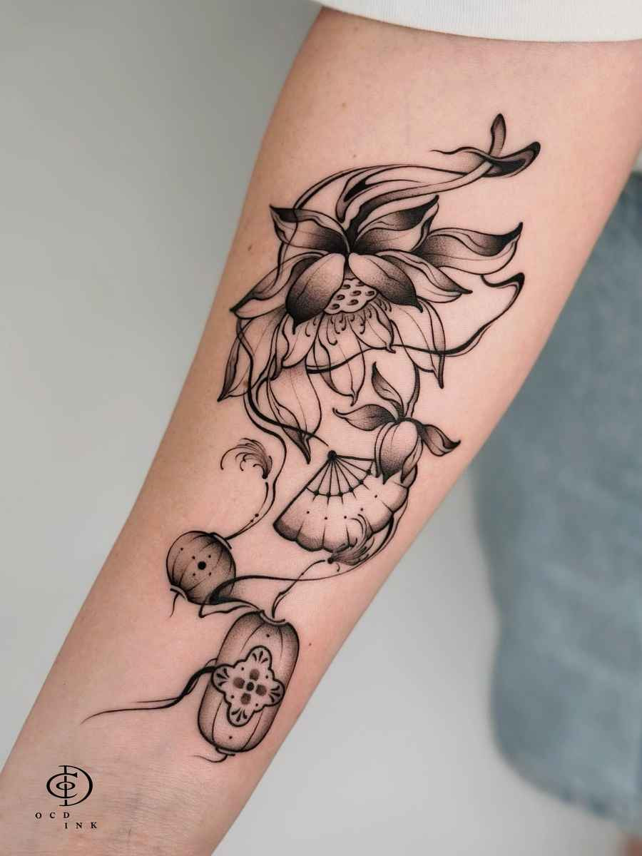 Blackwork Blackwork tattoo of a flowing lotus flower and seed pod design with fine-line shading on the forearm