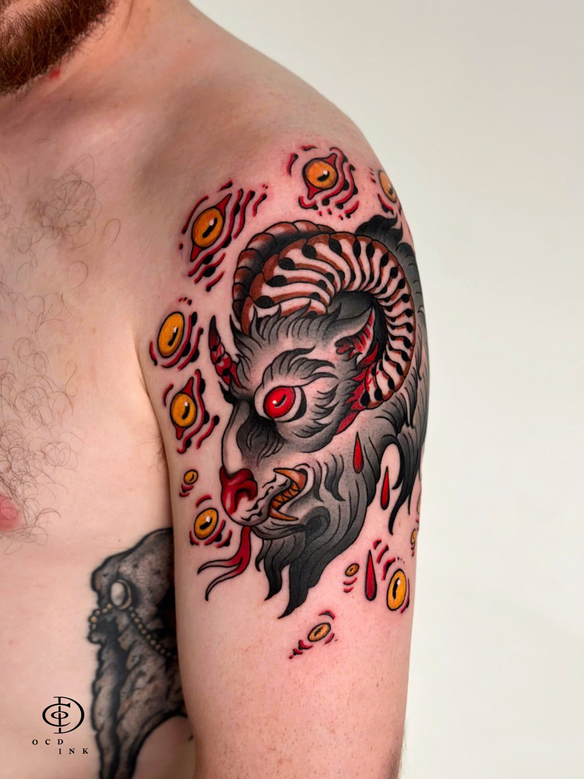 Traditional ram head tattoo at OCD Ink Studio, featuring a bold and powerful design inspired by classic traditional art tattoo on the arm by OCD Ink Studio in Hoi An