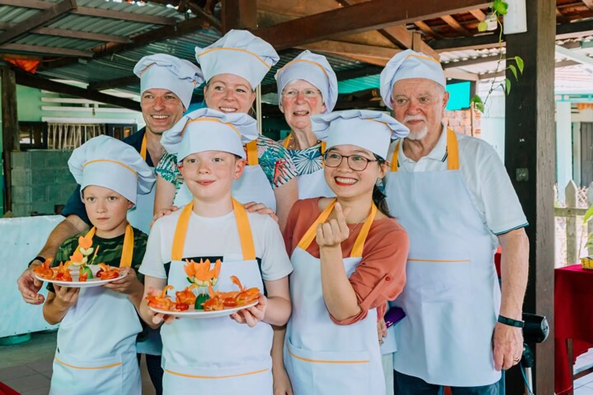 Family enjoying Vietnamese food together at a restaurant